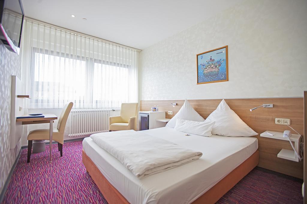 Hotel Am Bismarck MHG Pokoj fotografie