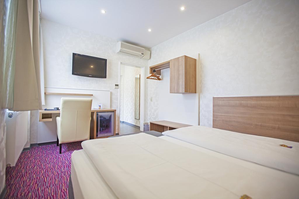 Hotel Am Bismarck MHG Pokoj fotografie